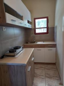 Dapur atau dapur kecil di olivensun bungalow 1