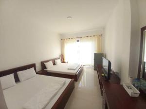 Ένα ή περισσότερα κρεβάτια σε δωμάτιο στο Villa In Great Location - Sea Front +52 φωτογραφίες