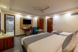 TV a/nebo společenská místnost v ubytování HOTEL NEU VILLA - New Delhi City Center