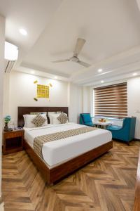 Postel nebo postele na pokoji v ubytování HOTEL NEU VILLA - New Delhi City Center