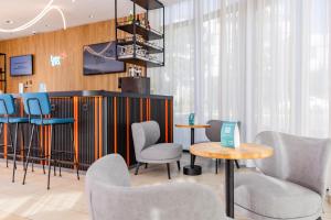Posezení v ubytování Hey Lou Hotel Hildesheim