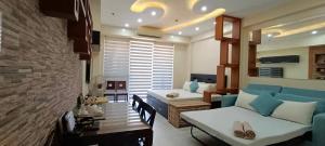 Posezení v ubytování PICO DE LORO RESORT CONDOTEL