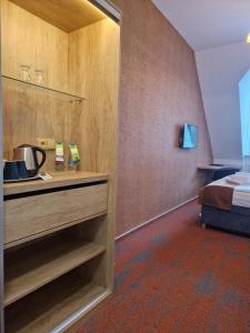 Krevet ili kreveti u jedinici u okviru objekta Hotel Skicentrum