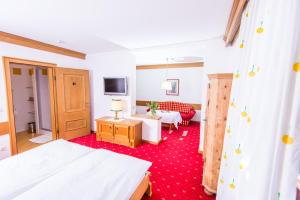 Voodi või voodid majutusasutuse Hotel zur Post toas