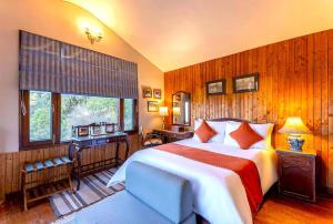 Ένα ή περισσότερα κρεβάτια σε δωμάτιο στο Bliss 3 Bedroom Villa Nainital Hills