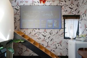 TV o dispositivi per l'intrattenimento presso Xizhi B&B & Two-bedroom House