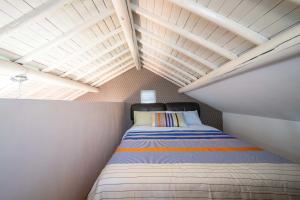 Letto o letti in una camera di Xizhi B&B & Two-bedroom House