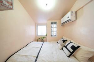 Letto o letti in una camera di Xizhi B&B & Two-bedroom House