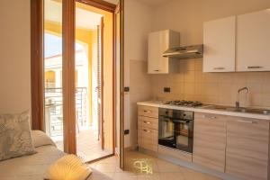 Kuchyň nebo kuchyňský kout v ubytování Alghero centro Charme