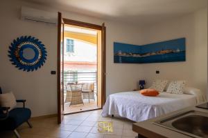 Postel nebo postele na pokoji v ubytování Alghero centro Charme