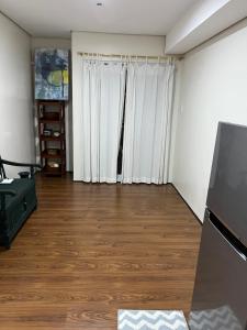 Imagen de la galería de Unit 509 Sitio Uno Condominiu, en Roxas City
