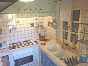 Köök või kööginurk majutusasutuses Casale Ai Poggi