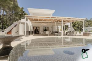 a rendering of a villa with a swimming pool at HOTIDAY Room Collection - Mattinata Faraglioni in Mattinata