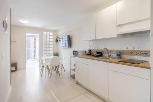 Kuchyň nebo kuchyňský kout v ubytování Apartamento Frente al Mar Con Parking