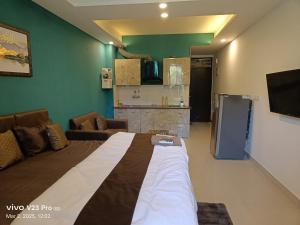 Μια τηλεόραση ή/και κέντρο ψυχαγωγίας στο Malsi Hideaway Studio