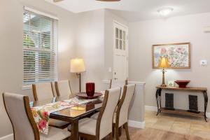 a dining room with a table and chairs at Ko Olina Kai 1059F in Kapolei +35 photos