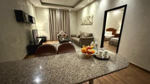 Telewizja i/lub zestaw kina domowego w obiekcie Le Park Hotel