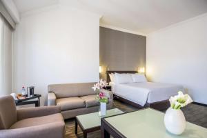 Letto o letti in una camera di NH Collection Quito Royal