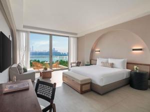 Postel nebo postele na pokoji v ubytování Rixos The Palm Hotel & Suites - Ultra All Inclusive