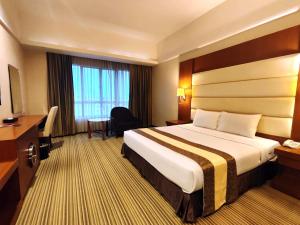 Postel nebo postele na pokoji v ubytování Pearl View Hotel Prai, Penang