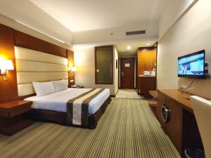 Postel nebo postele na pokoji v ubytování Pearl View Hotel Prai, Penang