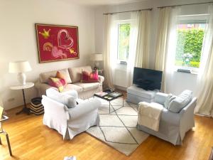 Posezení v ubytování Am Apfelbaum, ein Ferienhaus zwischen Rhein und Mosel