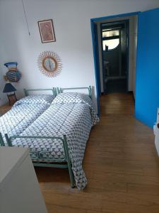 Posteľ alebo postele v izbe v ubytovaní relax e atmosfera di mare