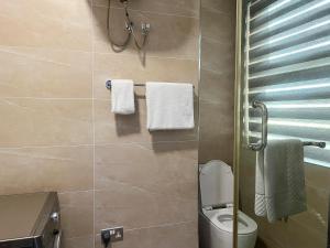 Koupelna v ubytování Orbit Apartments