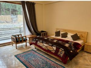Postel nebo postele na pokoji v ubytování Hg resort and camp kasol