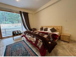 Postel nebo postele na pokoji v ubytování Hg resort and camp kasol