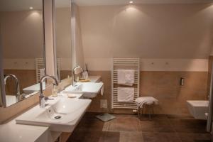 Koupelna v ubytování Hotel Deimann