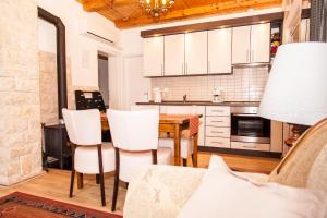 Kuchyň nebo kuchyňský kout v ubytování Apartments Bramado