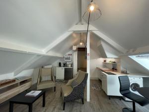 a kitchen and living room with an attic at Les Gîtes de La Maison Bleue d'Estialescq in Estialescq +106 photos