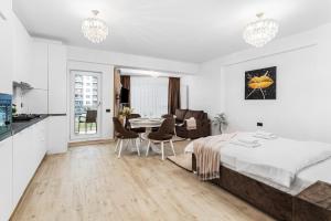 Giường trong phòng chung tại Chocolat Studios - Infinity Pool & Spa Resort