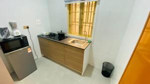 Kuhinja ili čajna kuhinja u objektu Petalz Home