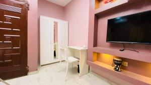TV i/ili multimedijalni sistem u objektu Petalz Home