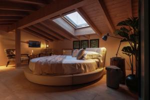 Postel nebo postele na pokoji v ubytování AGRIRESORT BACARINGHE 13, Emma Villas