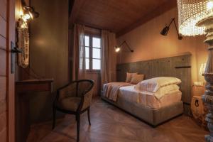 Postel nebo postele na pokoji v ubytování AGRIRESORT BACARINGHE 13, Emma Villas + 35 fotografií