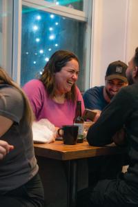 a group of people sitting at a table at CoDE Pod – The CoURT - Edinburgh in Edinburgh