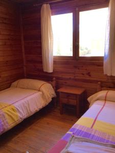 En eller flere senger på et rom på Camping Sierra Espuña
