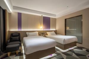 Shenzhen Jincheng Hotel客房内的一张或多张床位
