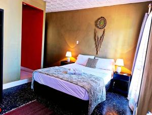 Giường trong phòng chung tại Executive Suite with Balcony and Veranda