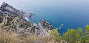 a view of the ocean from a mountain at B&B Campo del Mare in Sirolo +31 photos