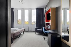 Postel nebo postele na pokoji v ubytování Best Western Hotel Norrkoping City