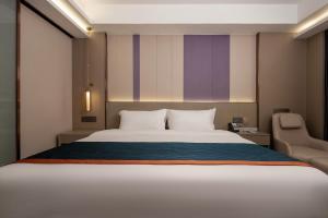 Shenzhen Jincheng Hotel客房内的一张或多张床位
