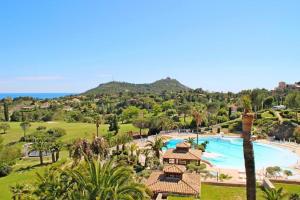 an aerial view of a resort with a swimming pool at La Perle Blanche in Saint-Raphaël