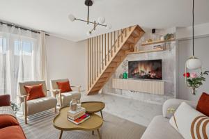Χώρος καθιστικού στο Maison cosy, neuve et lumineuse