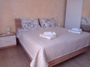 Voodi või voodid majutusasutuse Rooms Šećer toas