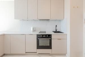 Kuchyňa alebo kuchynka v ubytovaní Rent40 Apartamenty Aura 2 Gdańsk Old Town