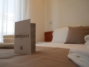 Postel nebo postele na pokoji v ubytování Hotel Regal